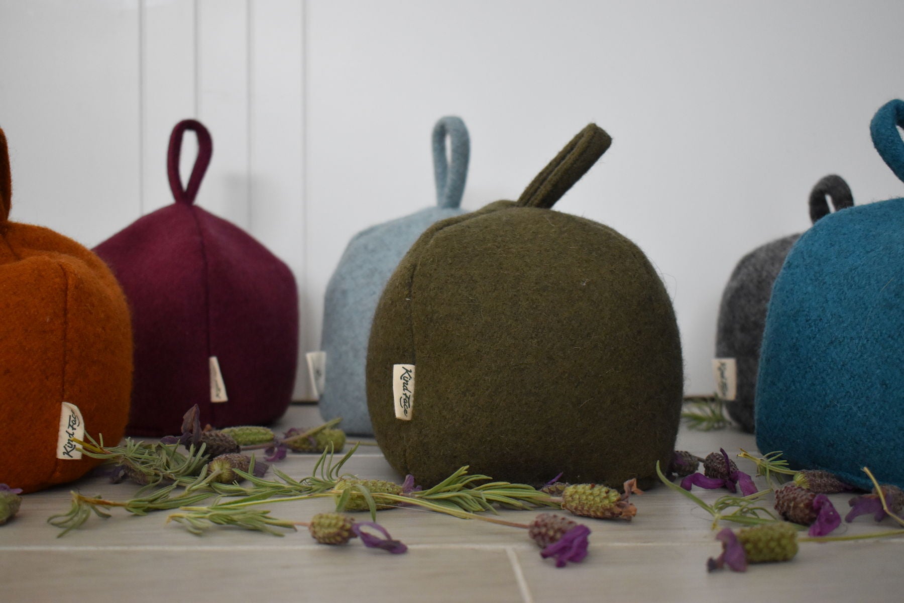 Kind Face - Felted NZ Wool Door Stop Family_1800x1200px.JPG__PID:c3282be3-215d-45a9-8f6c-7e792615e85f