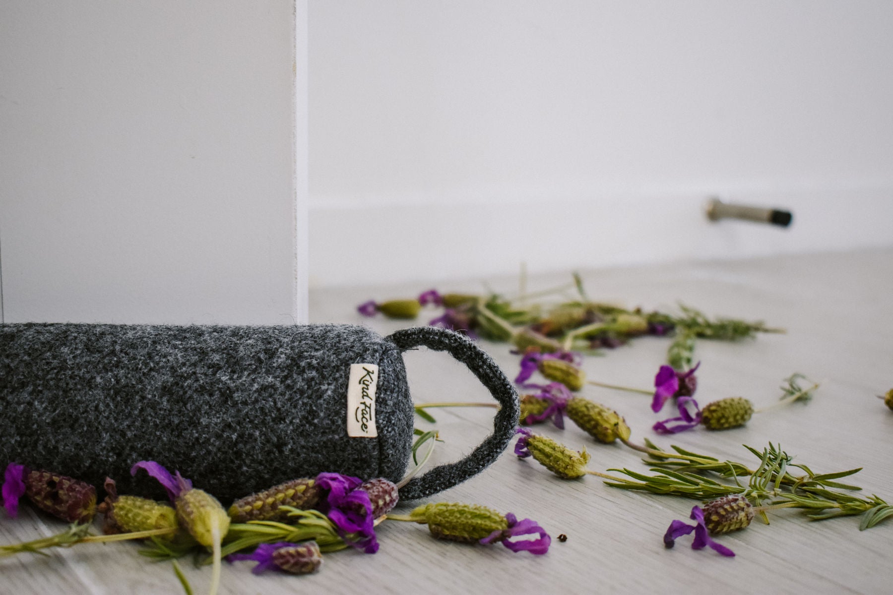Kind Face - Invite nature into your home with our felted NZ wool Draught Stopper_1800x1200px.JPG__PID:48d4b8ba-41b8-49e3-a42b-f769249fc9ce