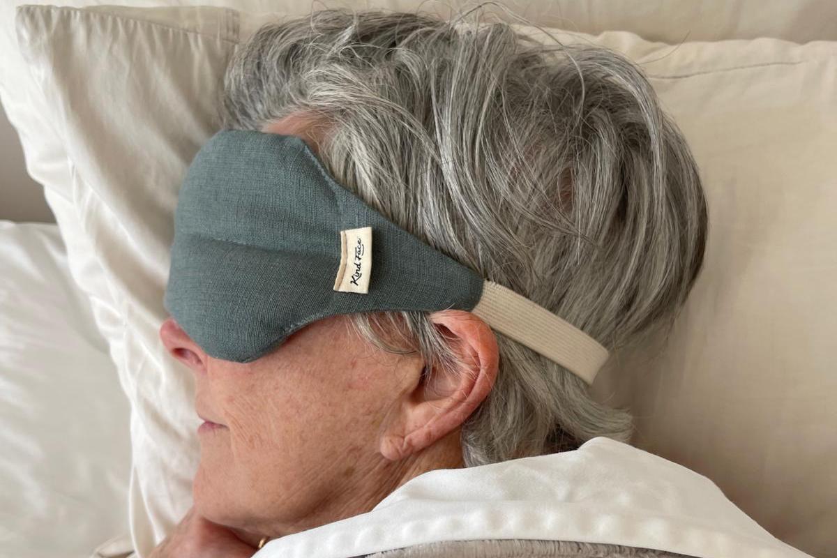 Kind Face_Aunty Francey enjoying her Weighted Eye Mask 2_TEAL.jpg__PID:258c8465-e292-40cc-b16a-7633d41dcc7f