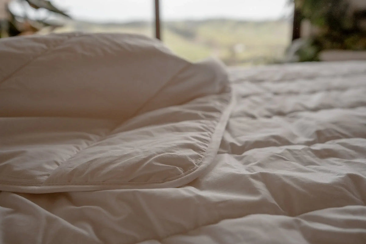 Cotton next to your skin. New Zealand wool all around you.