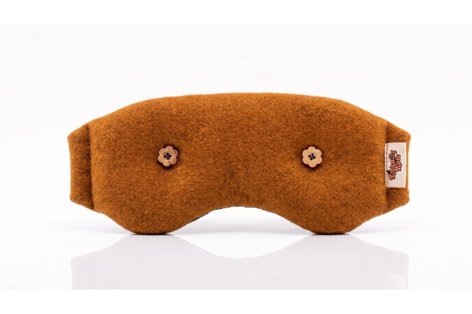 Ethically Kate's Weighted Eye Mask in Orchard Orange felted NZ wool on the front with wooden sunflowre button eyes