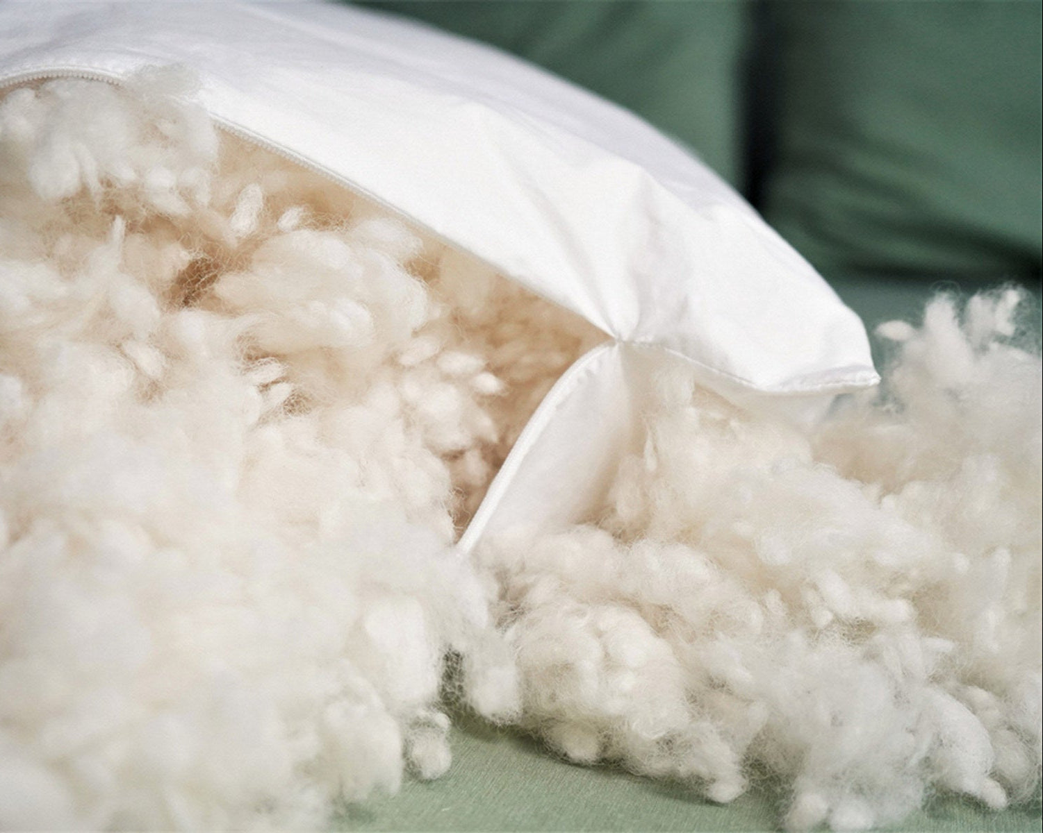 Kind Face Cloud Wool Pillow Zipped Open with Cloud Wool Fill Coming Out of It