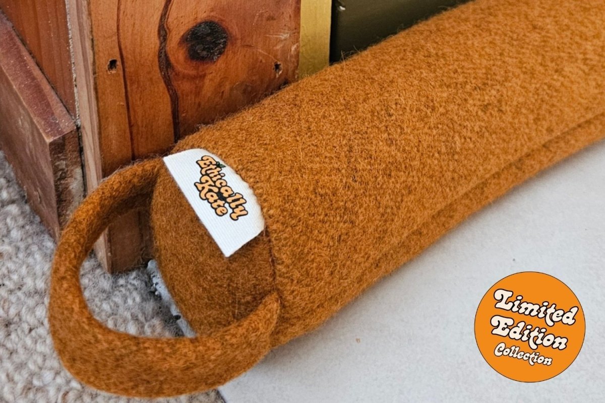 Close up picture of Ethically Kate's felted NZ wool draught stopper, in Orchard Orange colourway