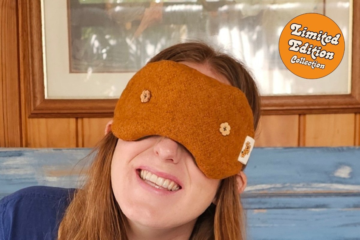 Close up picture of Ethically Kate and her favourite Weighted Eye Mask - featuring felted NZ wool, in Orchard Orange colourway